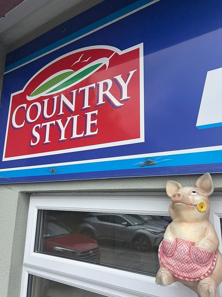 The Country Style sign at the outlet entrance