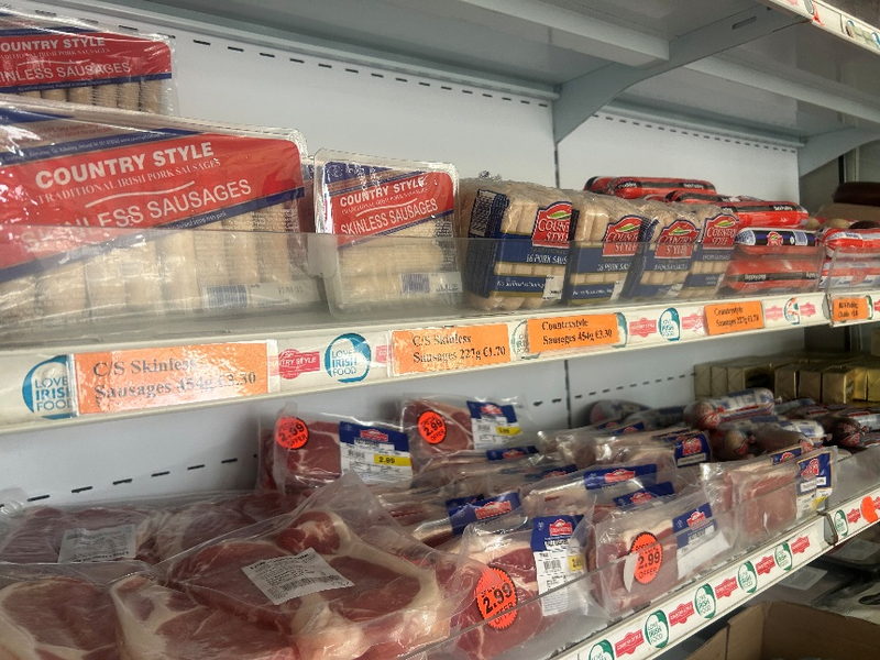 Country Style sausages and rashers on a supermarket shelf in the southeast