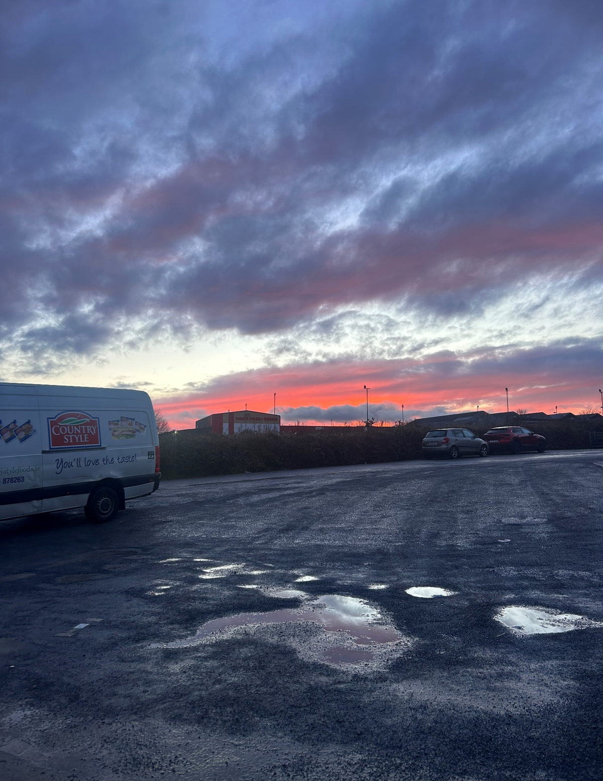 First light over the Grannagh yard, with a Country Style van parked ready for the morning run